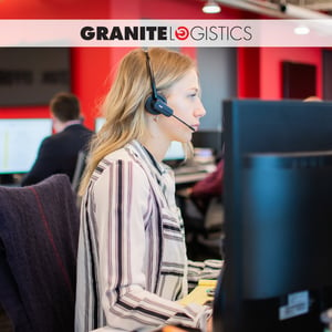 woman with headset working on computer