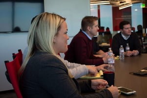 Group of Granite Logistics employees sitting around conference room table